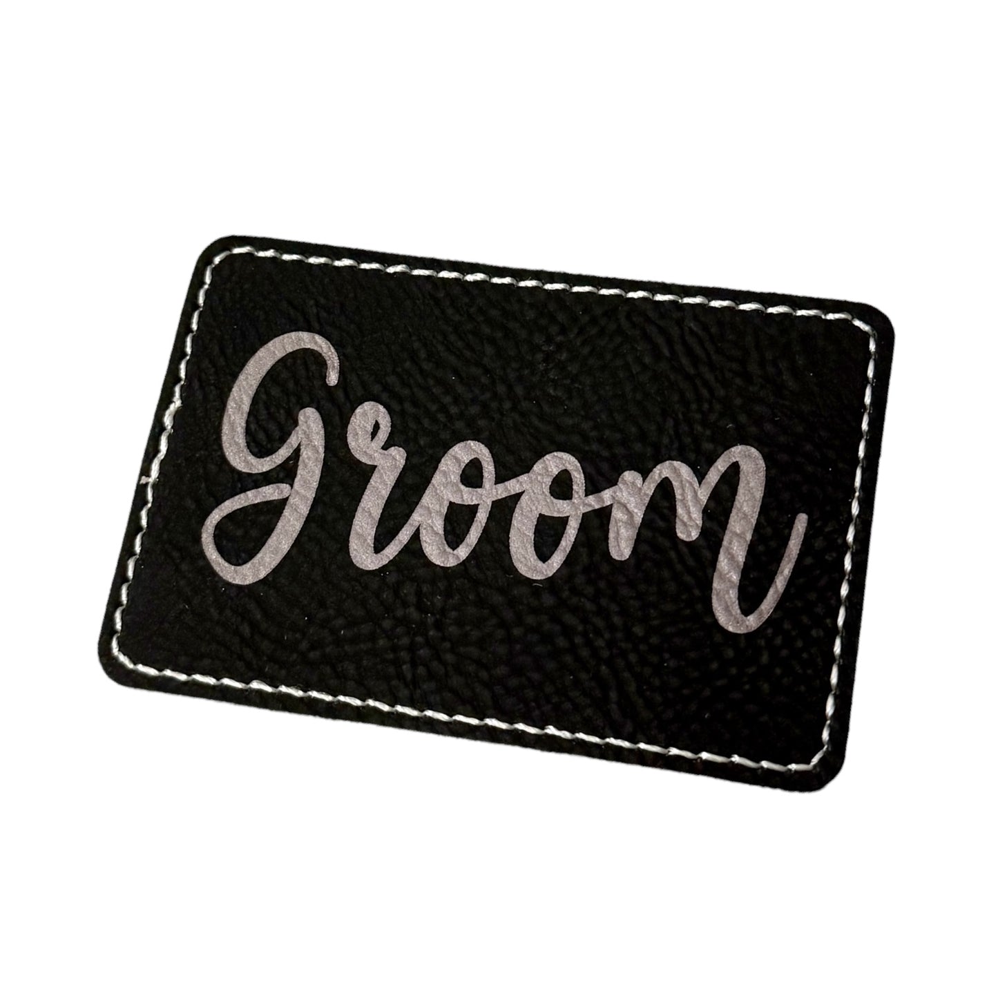 Laserable leatherette patch with adhesive