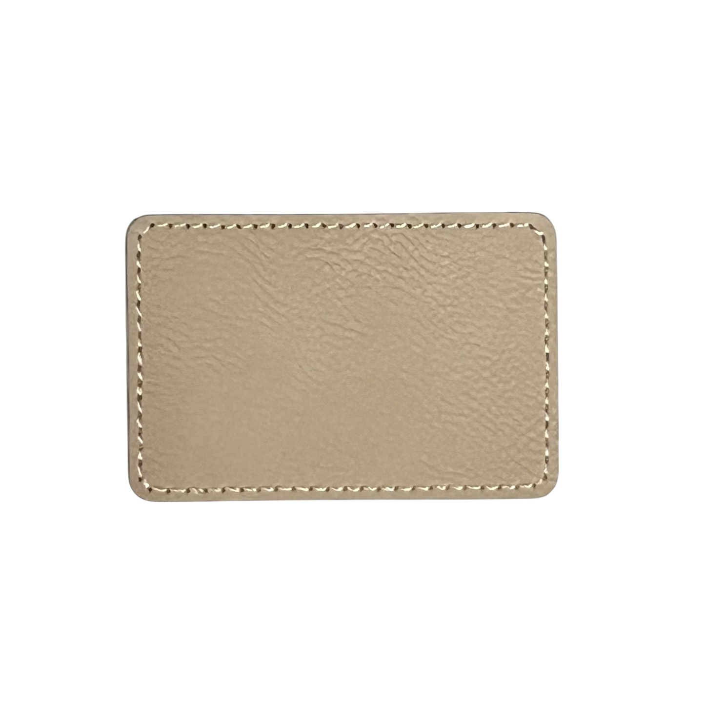 Laserable leatherette patch with adhesive