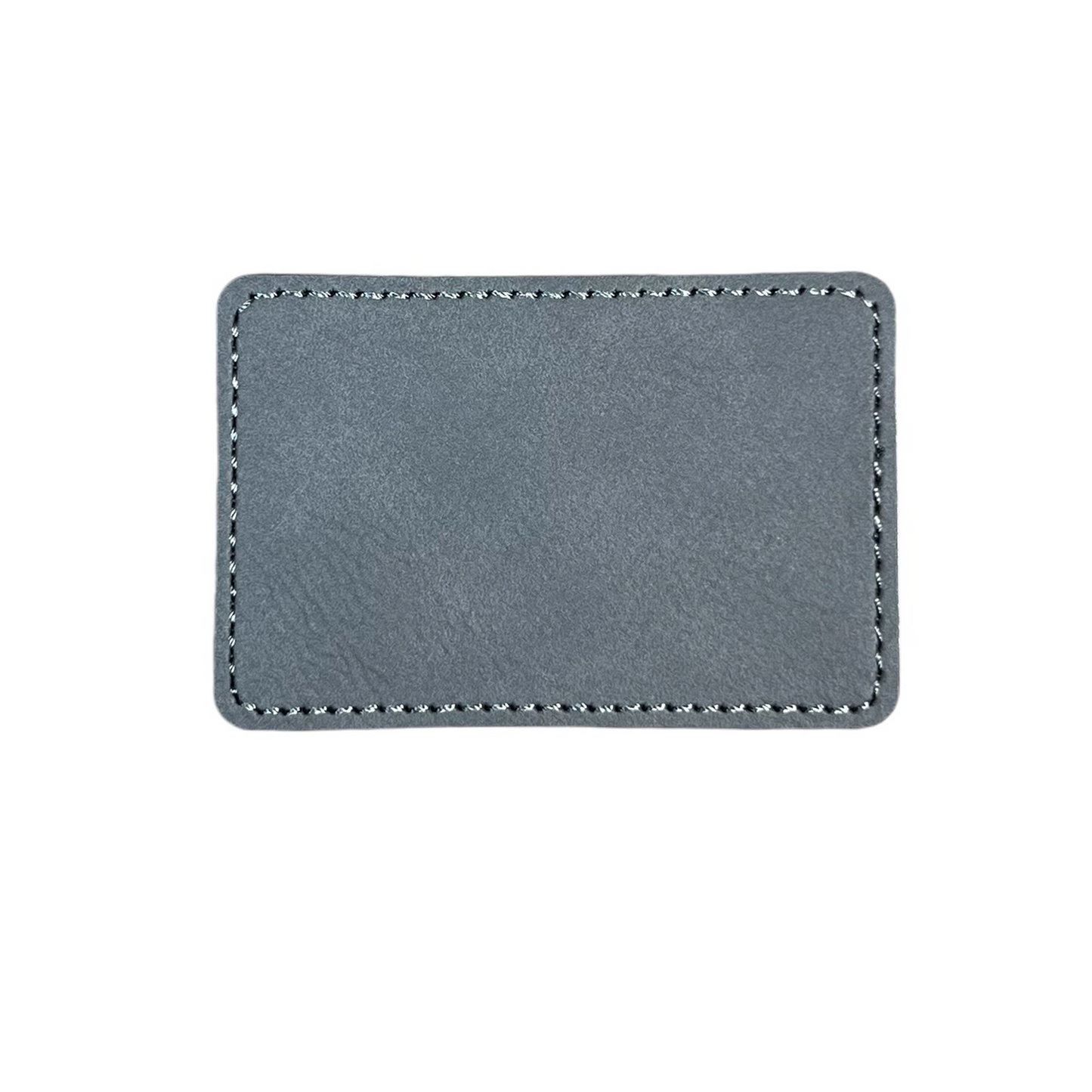 Laserable leatherette patch with adhesive